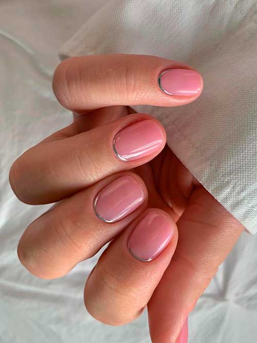 Short reverse French nude nails with mirror chrome reverse nail tips