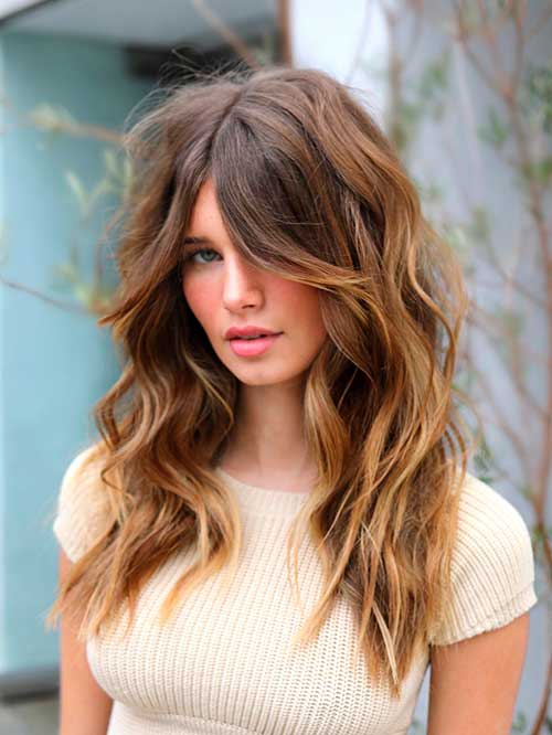 Curtain Bangs The curtain bangs long hair is a trendy haircut during 2023