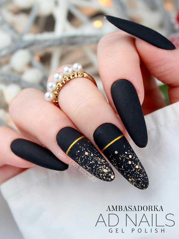 Long Round Shaped Matte Black Nails with Gold Glitter Is One of the Best Black Nail Designs to Try in 2023