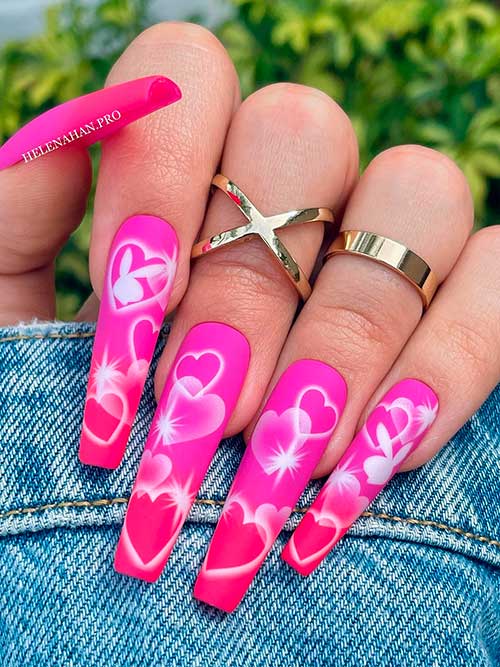Ombre Pink Valentine’s Nails Long coffin-shaped matte ombre Pink Valentine’s Day nails with white hearts