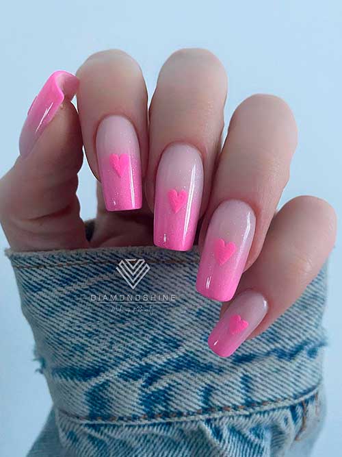 Ombre Pink Valentine’s Day Nails Long square-shaped ombre pink valentine’s day nails with a pink heart shape on each nail