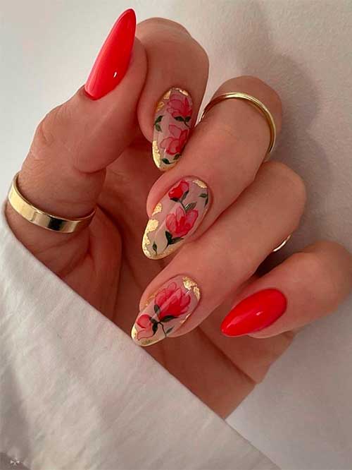 Medium almond-shaped red floral nails with gold foil for spring 2023