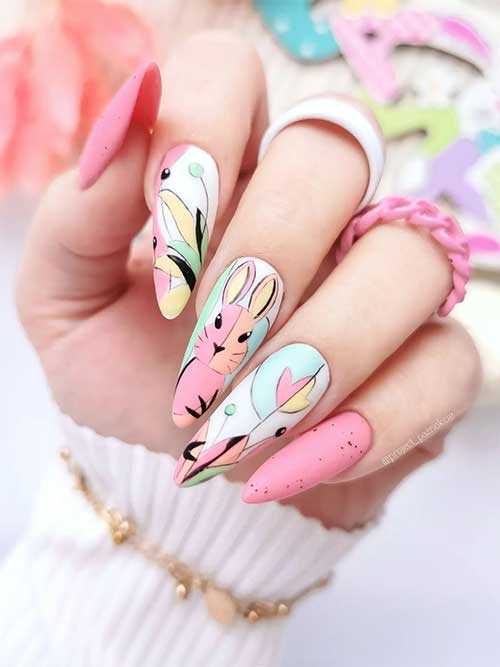 Long Almond Shaped Matte Pink Abstract Bunny Nail Art Design with Black Speckles