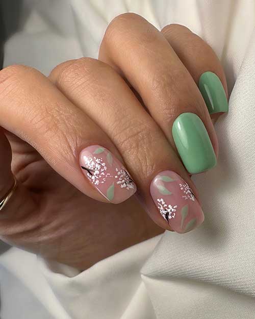 Short Green Nails with Flowers Short Green Nails with Flowers on Two Accent Nails for the Springtime