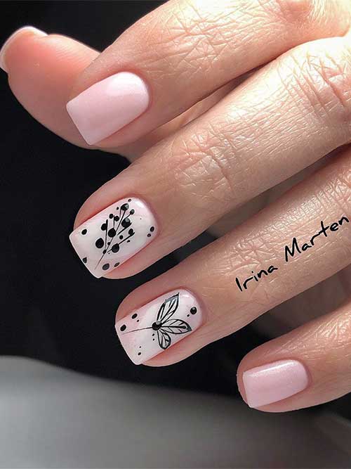 Short Light Pink Spring Nails with Black Leaf Nail Art