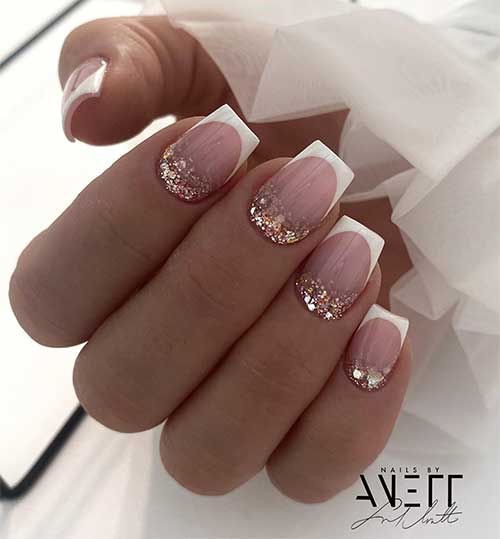 Short White French Tip Nails With Glitter Above Cuticle Area