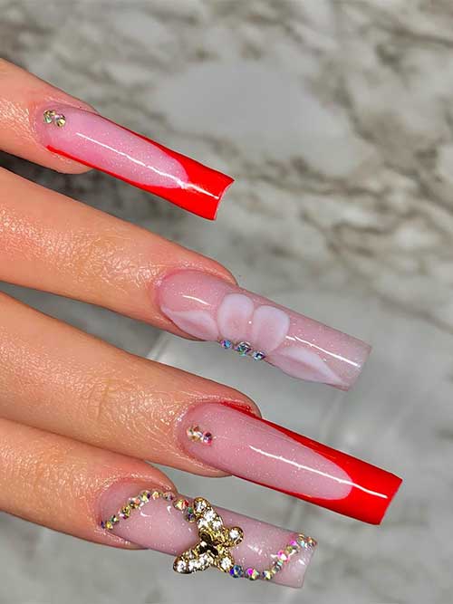 Spring French Manicure with Red Tips Long Square Shaped Spring French Manicure with Red Tips and Floral Nail Art and Rhinestones on Nude Accent Nails