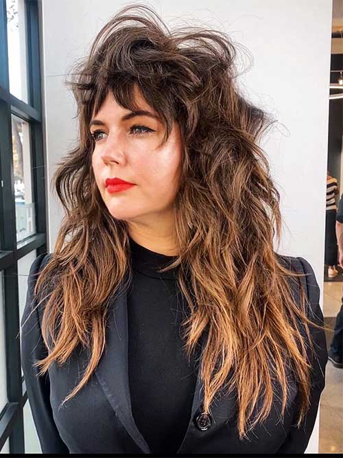 Layered and textured long shaggy hair for thick hair with bangs