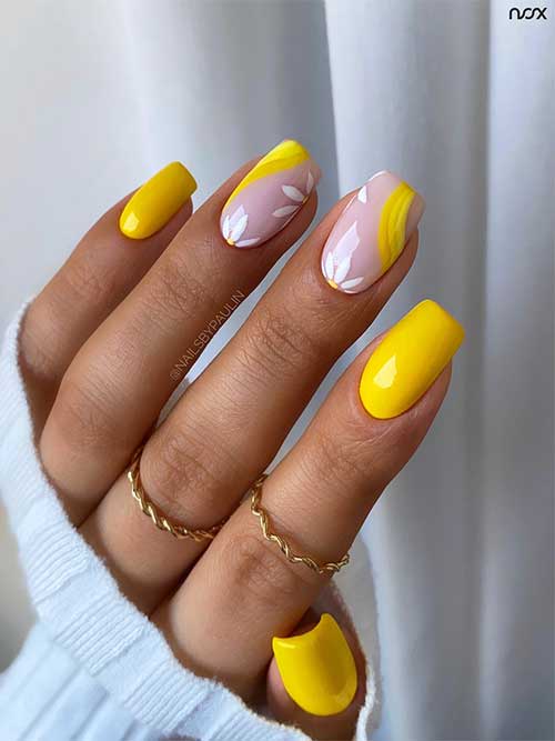 Short square bright yellow nails with daisy flowers on two accent nails for summer 2023 Short square bright yellow nails with daisy flowers on two accent nails for summer 2023