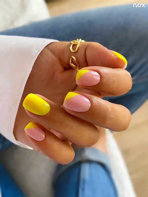 Short square bright yellow nails with diagonal French tips