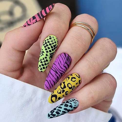 Long almond matte different animal print nails features snake, leopard, cheetah, and zebra prints