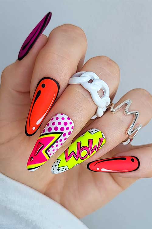 Long almond multicolored neon comic nails with WOW word and polka dots on two accent nails