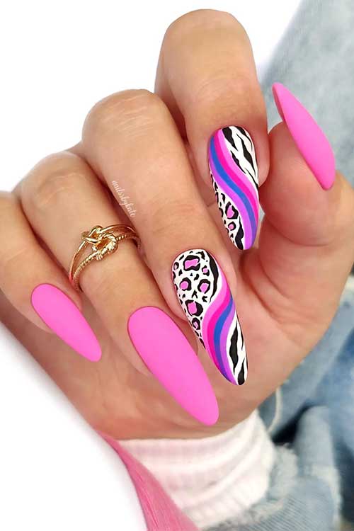 Long almond shaped matte pink nails with swirls, leopard, and zebra prints on two accent nails
