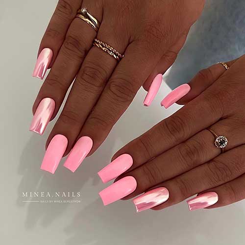 Long square shaped barbie light pink nails with two pink chrome accent nails Long square shaped barbie light pink nails with two pink chrome accent nails