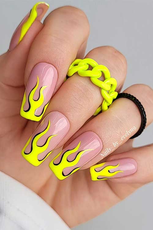 Medium square shaped neon yellow French flame nails