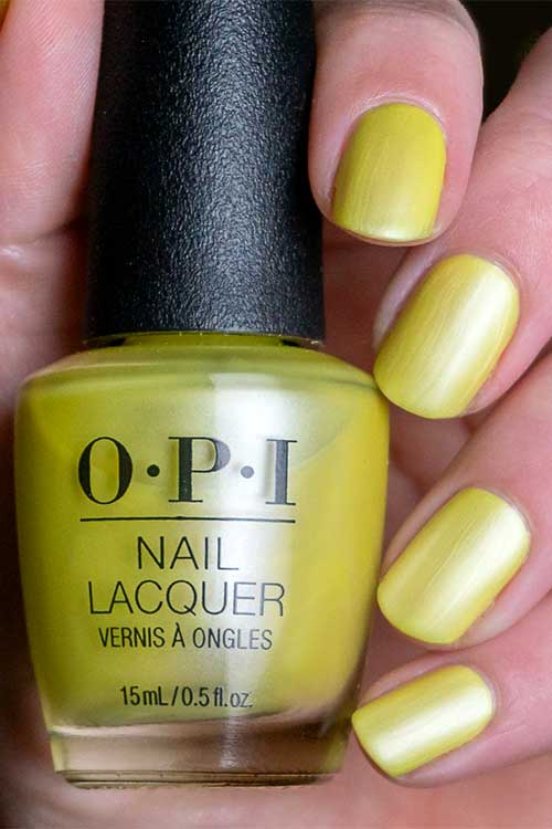 Short pearl yellow nails using Sunscreening My Calls from the OPI summer Make the Rules collection