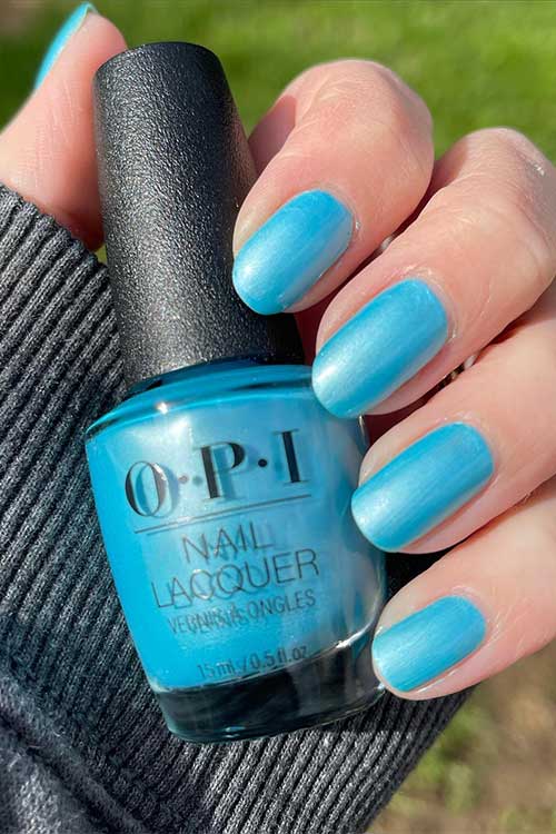 Short sky blue pearl nails using OPI Surf Naked from OPI summer Make the Rules collection