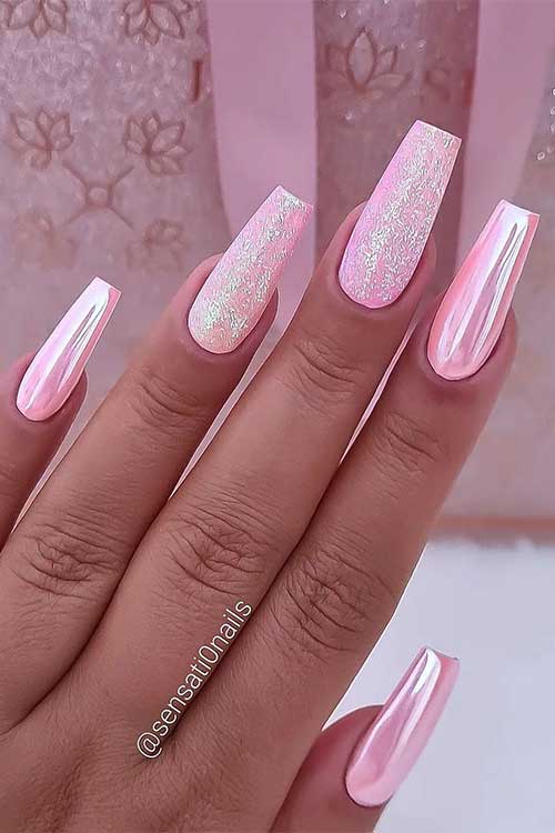 Light pink coffin gorgeous nails with chrome effect and adorned with micro silver glitter on two accent nails