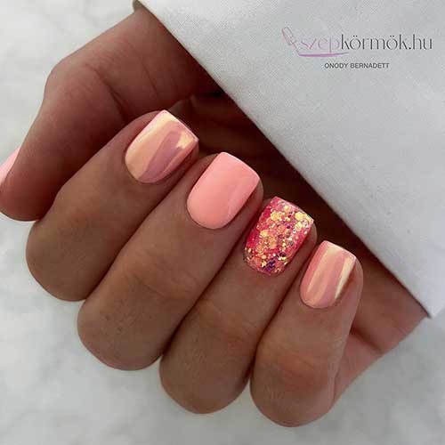 Short square shaped pink nails with glitter and metallic accent nails
