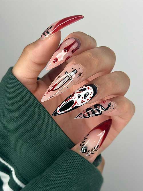 Creepy red and black Halloween nails with blood drip, a scary face, knife, and snake nail art designs.
