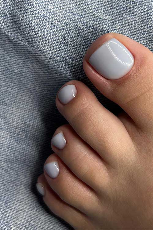 Cute solid light gray toe nails.