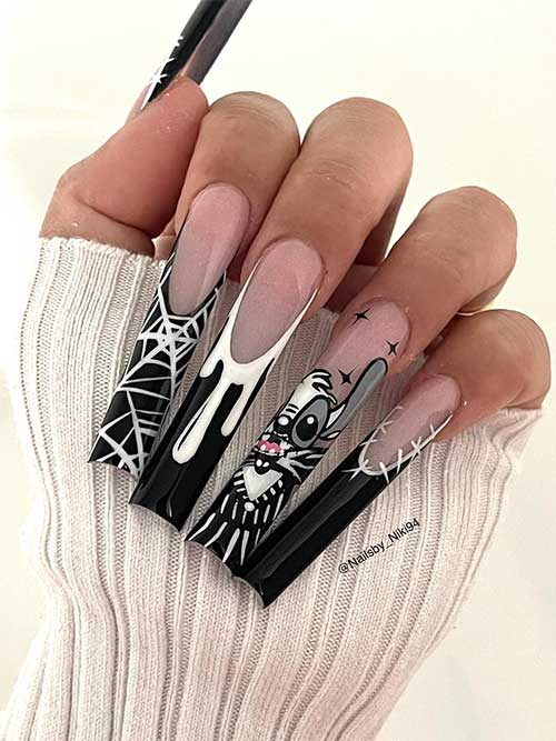 Long black French tip nails with white Halloween nail art designs feature bat, cobweb, blood drip, and stitches accents.