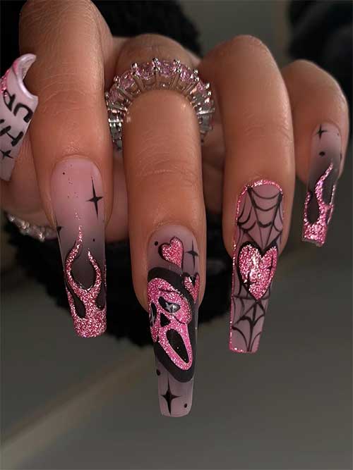 Long nude nails with black ombre, and celestial nail art. Besides, glitter pink scream face, and flame nail art.
