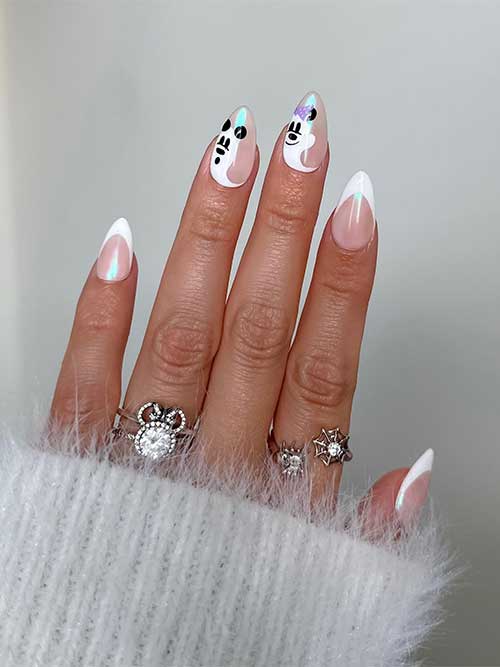 Medium white French tip nails with chrome effect and Mickey and Minnie ghosts on two accent nails. 