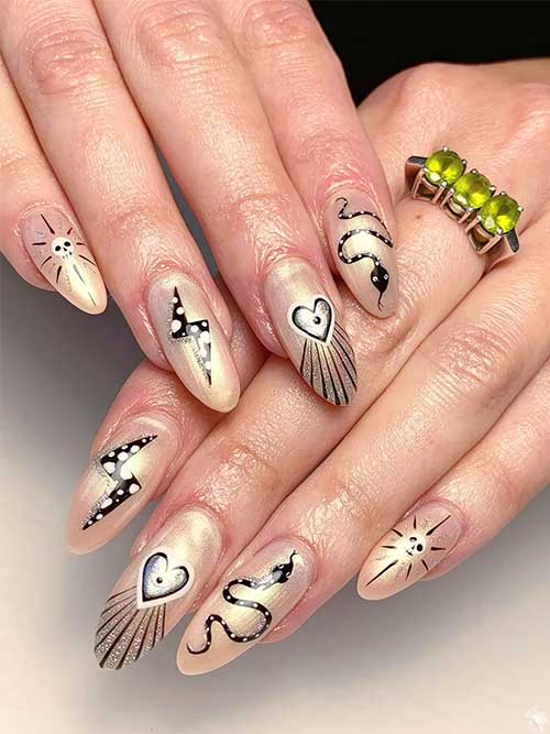 Nude chrome pearl nails with celestial and witchy Halloween nail art designs