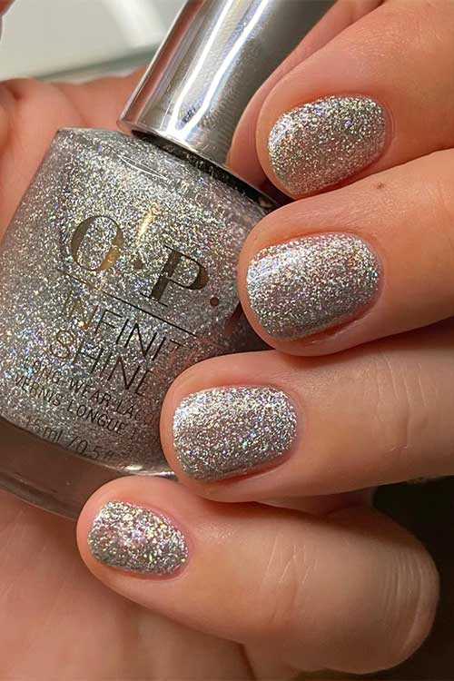 Short holographic silver nails using OPI I Cancer-tainly Shine from OPI Big Zodiac Energy Collection 2023 Short holographic silver nails using OPI I Cancer-tainly Shine from OPI Big Zodiac Energy Collection 2023