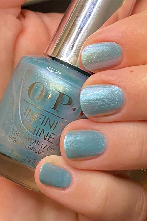 Short light blue pearl nails using OPI Pisces the Future from OPI Big Zodiac Energy Collection 2023 Short light blue pearl nails using OPI Pisces the Future from OPI Big Zodiac Energy Collection 2023