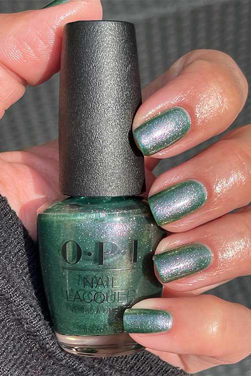 Short sage green shimmer nails using OPI Feelin' Capricorn-y from OPI Big Zodiac Energy Collection 2023