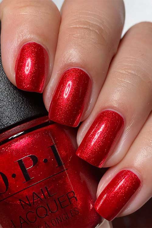 Short shimmer fiery red nails using OPI Kiss My Aries from OPI Big Zodiac Energy Collection 2023 Short shimmer fiery red nails using OPI Kiss My Aries from OPI Big Zodiac Energy Collection 2023