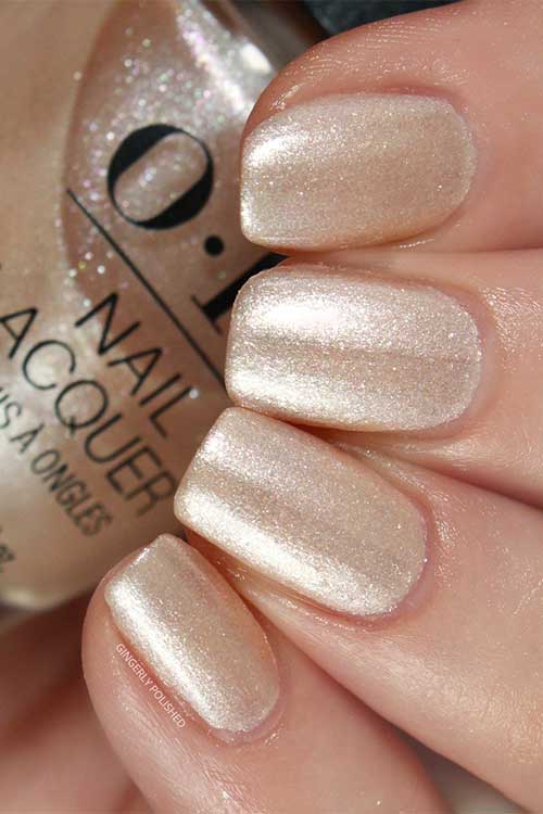 Short soft white shimmer nails using OPI Gemini and I from OPI Big Zodiac Energy Collection 2023 Short soft white shimmer nails using OPI Gemini and I from OPI Big Zodiac Energy Collection 2023