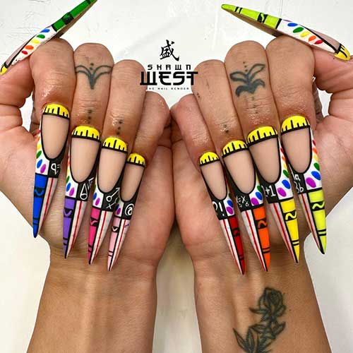 long stiletto French tip nails with different back to school nail art into abstract nail design