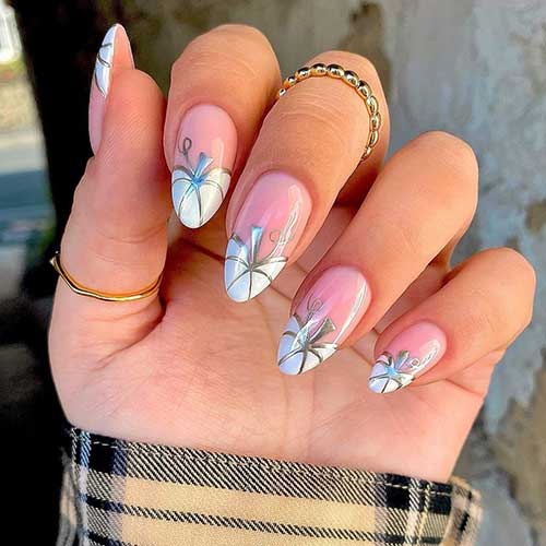 Medium almond shaped French white pumpkin nails with gold outlines and leaf nail art Medium almond shaped French white pumpkin nails with gold outlines and leaf nail art