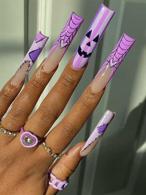 Long different purple shades French Halloween nails that feature cobwebs, striped nail art, and stitch nail art.