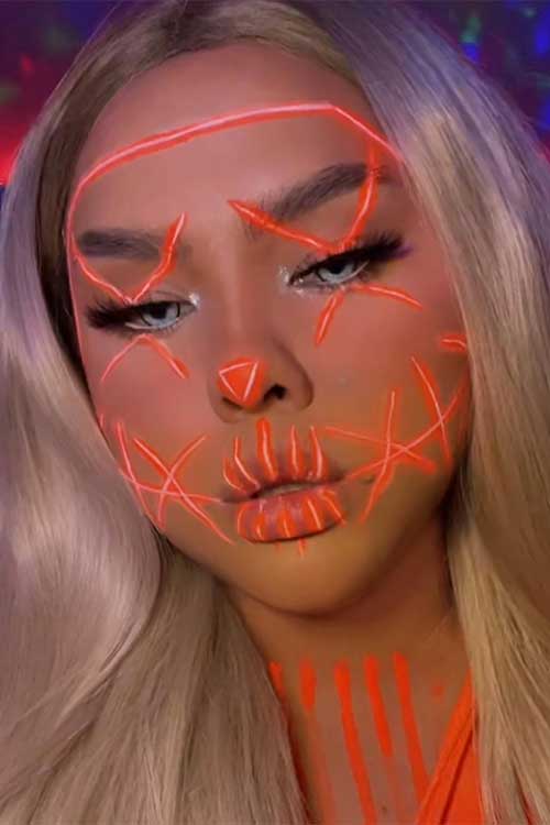 Orange neon purge makeup is one of the best Halloween makeup looks scary in 2023