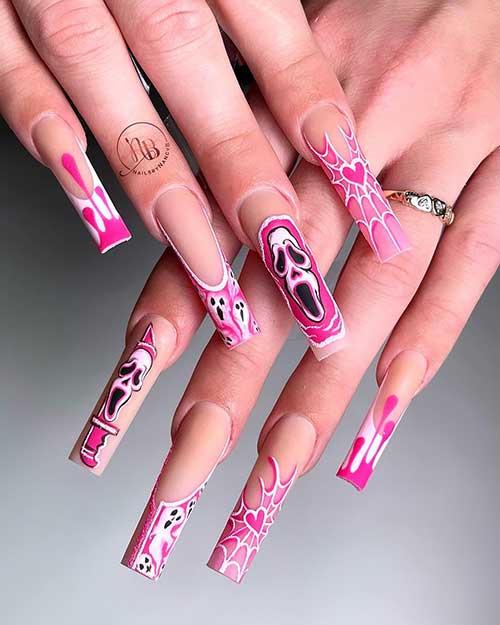 Scream black, white, and pink Halloween nails feature twisted French tips with cobwebs, tiny ghosts, and scream ghost face Scream black, white, and pink Halloween nails feature twisted French tips with cobwebs, tiny ghosts, and scream ghost face