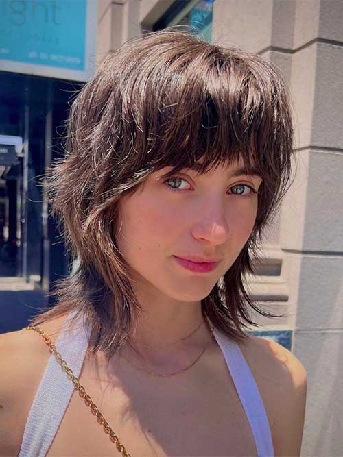 The Shag Cut is a trendy and textured hairstyle that offers a playful and carefree vibe