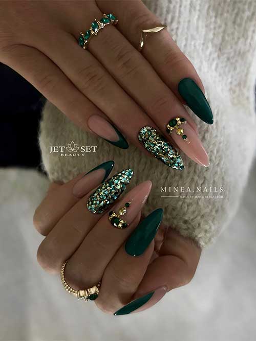 Long almond-shaped dark green nails with gold and dark green rhinestones are the best dark green nail designs for 2023 Long almond-shaped dark green nails with gold and dark green rhinestones are the best dark green nail designs for 2023