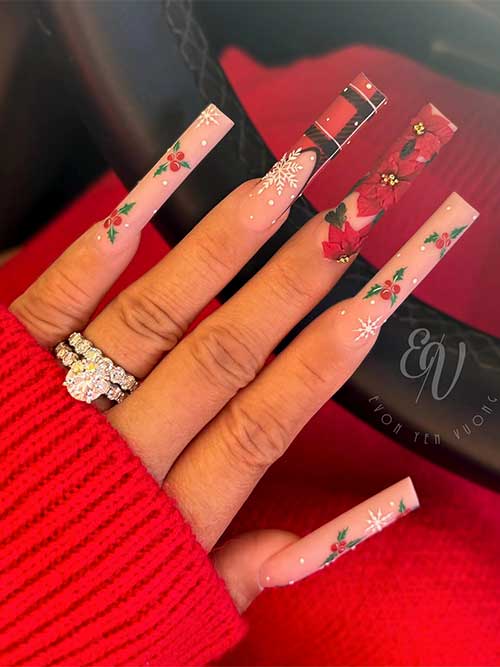 Long matte Christmas nude nails decorated with holly green leaves, snowflakes, white dots, and a French plaid accent nail