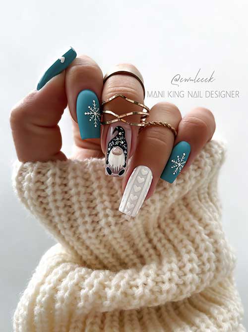 Matte teal Christmas nails with snowflakes, gnome nail art, and another accent sweater nail adorned with heart shape pattern