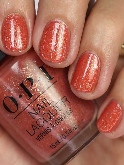 Metallic rose gold nails using OPI It's a Wonderful Spice nail polish from OPI Terribly Nice Holiday 2023 Collection