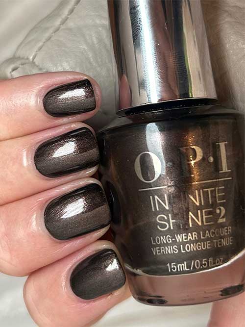 Shimmer brown nails using OPI Hot Toddy Naughty nail polish from OPI Terribly Nice Holiday 2023 Collection