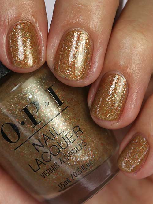 Short metallic gold nails using OPI Five Golden Flings nail polish from OPI Terribly Nice Holiday 2023 Collection