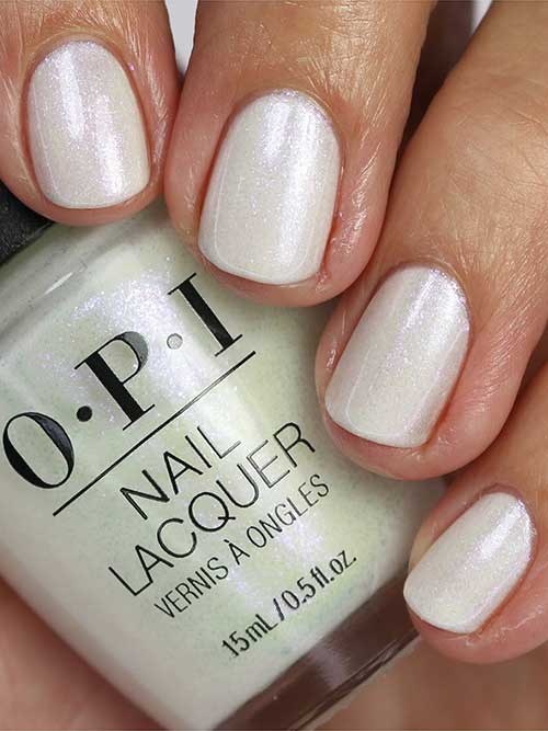 White and lilac shimmer nails using OPI Chill 'Em With Kindness nail polish from OPI Terribly Nice Holiday 2023 Collection