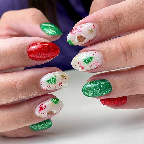 Dazzling glitter short red and green Christmas nails with two accent milky white nails adorned with Christmas motifs