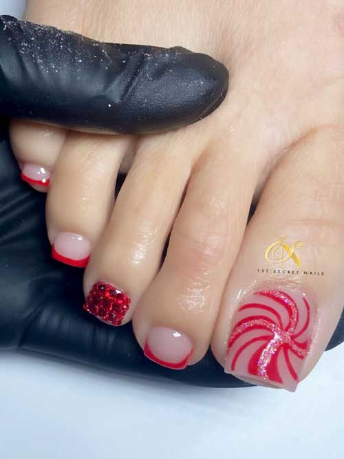 Festive red French Christmas toe nails feature a middle accent nail adorned with red gems and a candy cane big toenail