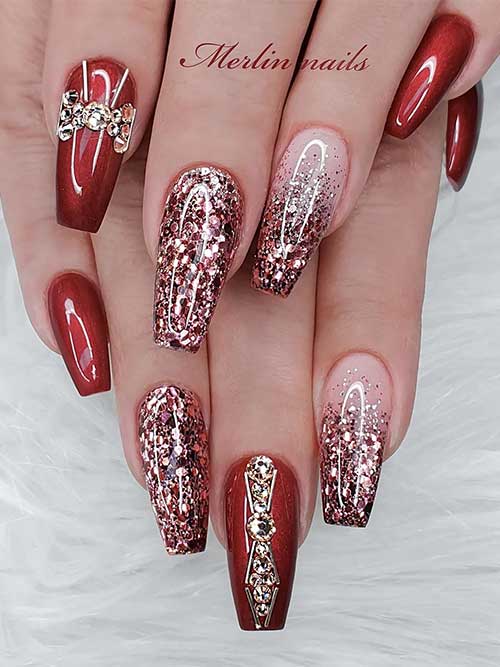 Glossy red New Years nails coffin shaped with gold rhinestones on an accent nail. Besides, two rose gold glitter accent nails